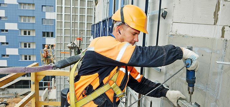 Worker wearing hearing protectors